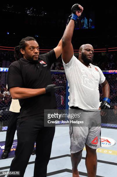 Derrick Lewis raises his hand in a decision over Francis Ngannou of Cameroon in their heavyweight fight during the UFC 226 event inside T-Mobile...