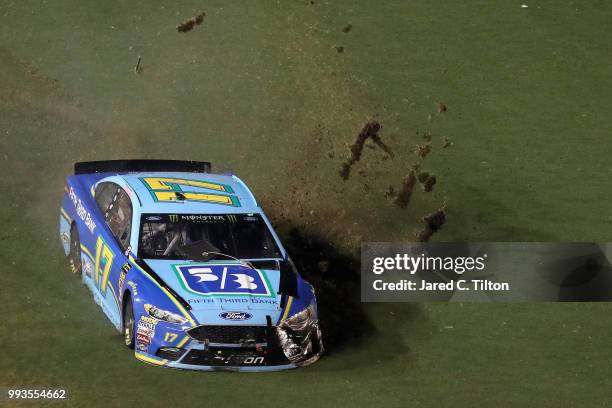 Ricky Stenhouse Jr., driver of the Fifth Third Bank Ford, is involved in an on-track incident during the Monster Energy NASCAR Cup Series Coke Zero...