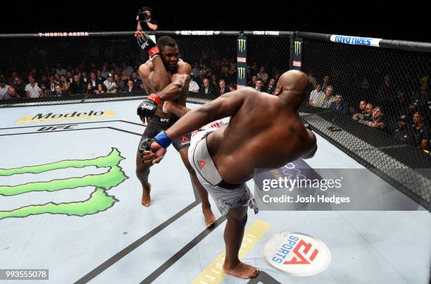 Derrick Lewis kicks Francis Ngannou of Cameroon in their heavyweight fight during the UFC 226 event inside T-Mobile Arena on July 7, 2018 in Las...