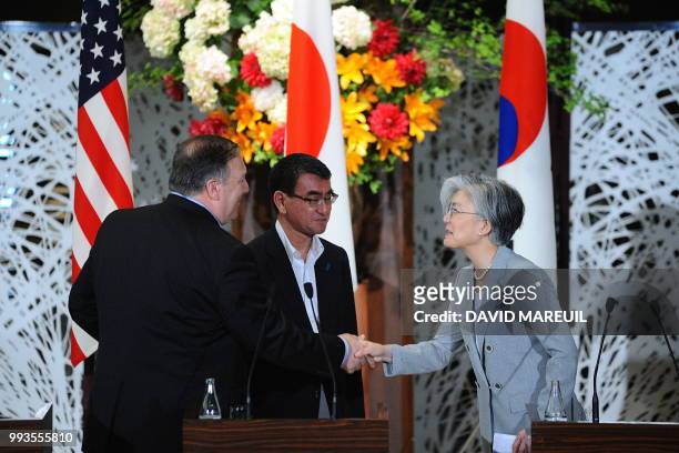 Secretary of State Mike Pompeo, Japan's Foreign Minister Taro Kono and South Korea's Foreign Minister Kang Kyung-wha attend a press conference at...