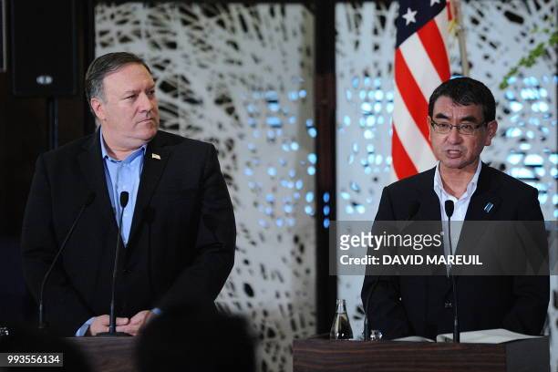 Secretary of State Mike Pompeo listens to Japan's Foreign Minister Taro Kono during a press conference with South Korea's Foreign Minister Kang...