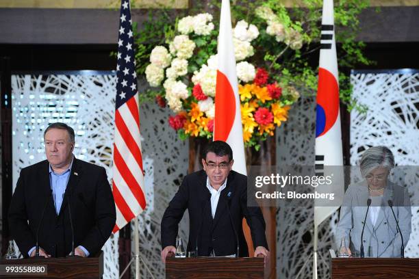 Taro Kono, Japan's foreign minister, center, speaks as Mike Pompeo, U.S. Secretary of state, left, and Kang Kyung-Wha, South Korea's foreign...