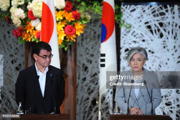 Kang Kyung-Wha, South Korea's foreign minister, right, speaks during a news conference with Taro Kono, Japan's foreign minister, left, and Mike...