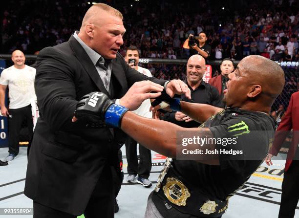 Brock Lesnar confronts Daniel Cormier after his UFC heavyweight championship fight during the UFC 226 event inside T-Mobile Arena on July 7, 2018 in...