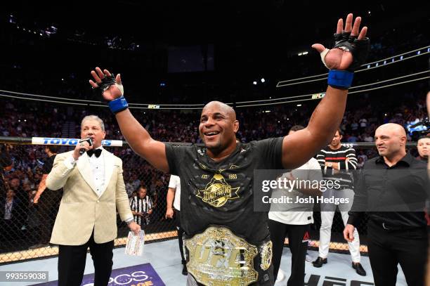 Daniel Cormier celebrates his victory over Stipe Miocic in their UFC heavyweight championship fight during the UFC 226 event inside T-Mobile Arena on...