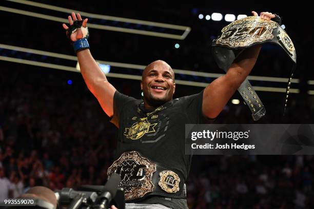 Daniel Cormier celebrates his victory over Stipe Miocic in their UFC heavyweight championship fight during the UFC 226 event inside T-Mobile Arena on...