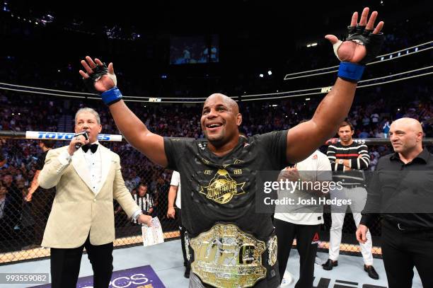 Daniel Cormier celebrates his victory over Stipe Miocic in their UFC heavyweight championship fight during the UFC 226 event inside T-Mobile Arena on...