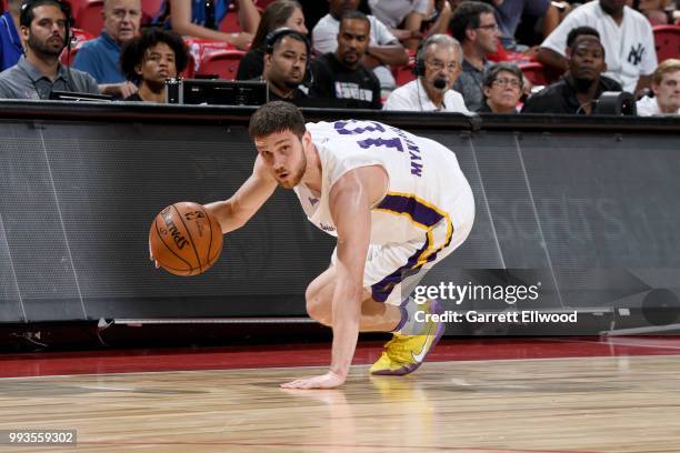 Svi Mykhailiuk of the Los Angeles Lakers handles the ball against the Philadelphia 76ers during the 2018 Las Vegas Summer League on July 7, 2018 at...