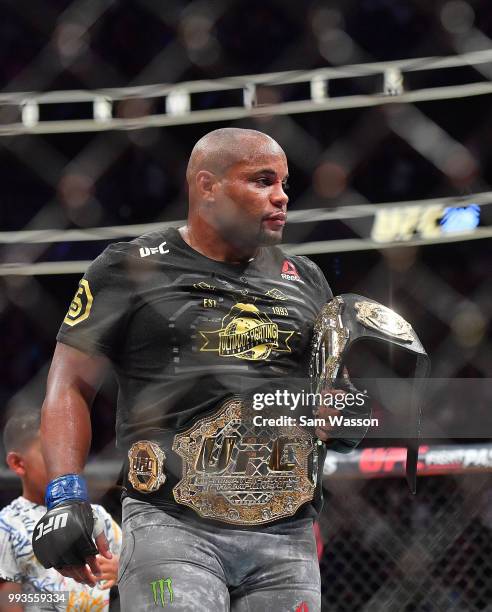 Daniel Cormier stands in the octagon after his heavyweight championship fight against Stipe Miocic at T-Mobile Arena on July 7, 2018 in Las Vegas,...