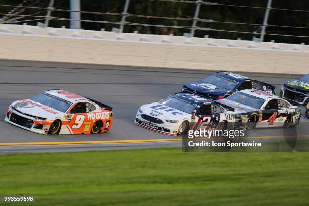 Chase Elliott, driver of the Hooters Chevrolet, leads the field early in the race during the Coke Zero Sugar 400 on July 7, 2018 at Daytona...