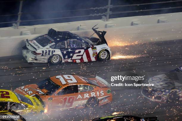 Brad Keselowski, driver of the Stars, Stripes and Lites Ford, spins during the Coke Zero Sugar 400 on July 7, 2018 at Daytona International Speedway...