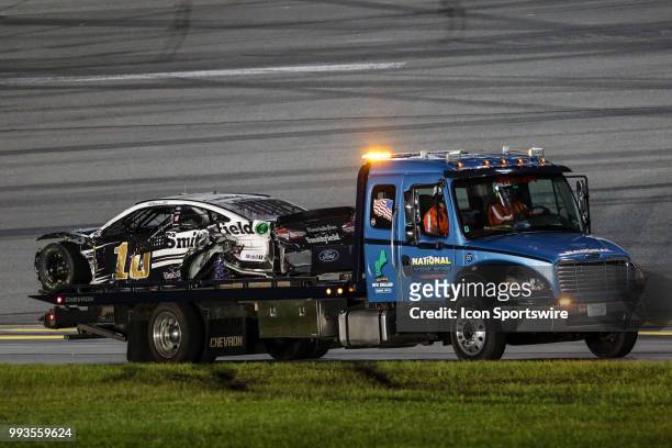 The damaged car of Aric Almirola, driver of the Smithfield Ford, during the Coke Zero Sugar 400 on July 7, 2018 at Daytona International Speedway in...