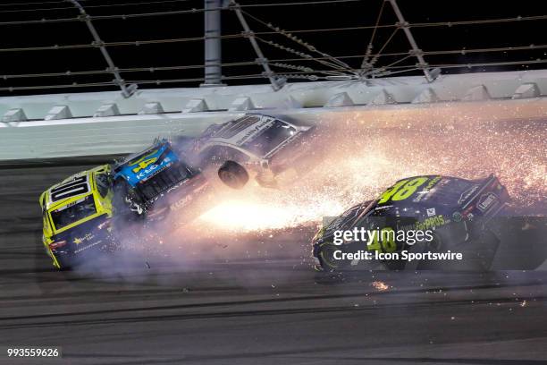 Joey Gase, driver of the Sparks Inc. Chevrolet, Michael McDowell, driver of the K-LOVE Radio Ford, and Aric Almirola, driver of the Smithfield Ford,...