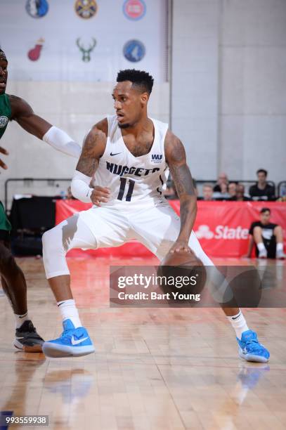 Monte Morris of the Denver Nuggets handles the ball against the Boston Celtics during the 2018 Las Vegas Summer League on July 7, 2018 at the Cox...