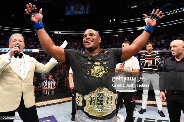 Daniel Cormier celebrates his victory over Stipe Miocic in their UFC heavyweight championship fight during the UFC 226 event inside T-Mobile Arena on...