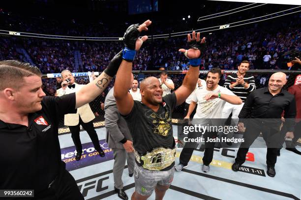 Daniel Cormier celebrates his victory over Stipe Miocic in their UFC heavyweight championship fight during the UFC 226 event inside T-Mobile Arena on...