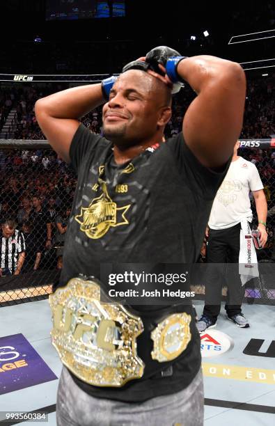 Daniel Cormier celebrates his victory over Stipe Miocic in their UFC heavyweight championship fight during the UFC 226 event inside T-Mobile Arena on...