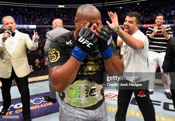 Daniel Cormier celebrates his victory over Stipe Miocic in their UFC heavyweight championship fight during the UFC 226 event inside T-Mobile Arena on...
