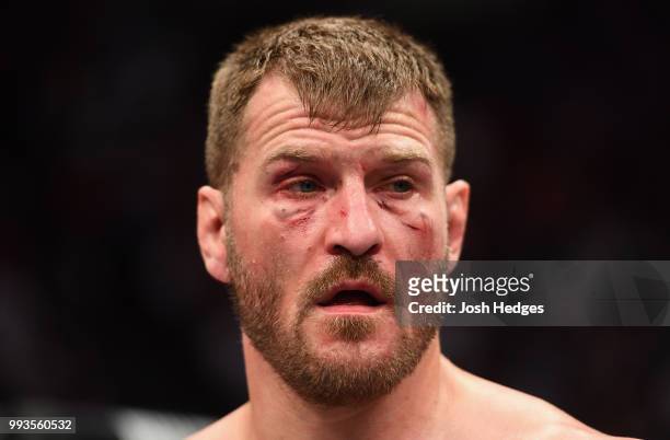 Stipe Miocic reacts to his knockout loss to Daniel Cormier in their UFC heavyweight championship fight during the UFC 226 event inside T-Mobile Arena...