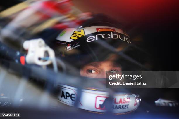 David Reynolds driver of the Erebus Penrite Racing Holden Commodore ZB looks on during the top ten shoot out for race 18 of the Supercars Townsville...