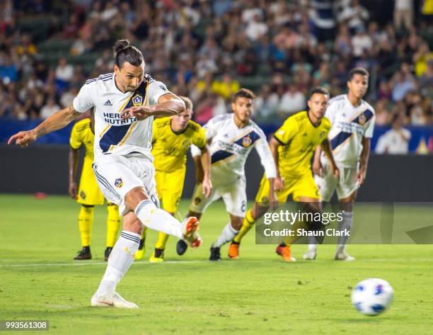 Zlatan Ibrahimovic of Los Angeles Galaxy scores a penalty kick during the Los Angeles Galaxy's MLS match against Columbus Crew at the StubHub Center...