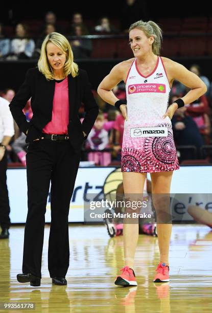 Jane Woodlands-Thompson chats to Leana de Bruin of the Thunderbirds after the round 10 Super Netball match between the Thunderbirds and the Magpies...