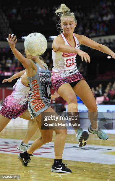 Charlee Hodges of the Thunderbirds intercepts a pass to Madi Robinson of the Magpies during the round 10 Super Netball match between the Thunderbirds...