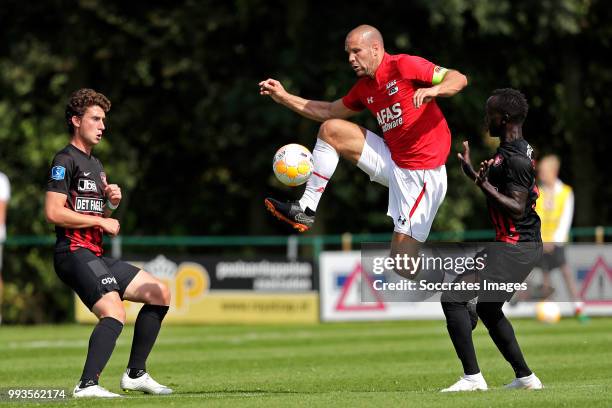 Ron Vlaar of AZ Alkmaar, Bubacarr Sanneh of FC Midtjylland during the Club Friendly match between AZ Alkmaar v FC Midtjylland at the VV Dirkshorn on...