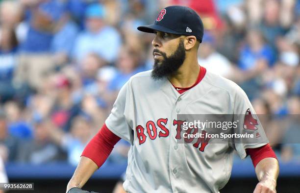 Boston Red Sox starting pitcher David Price watches a double hit by Kansas City Royals right fielder Jorge Bonifacio during a Major League Baseball...