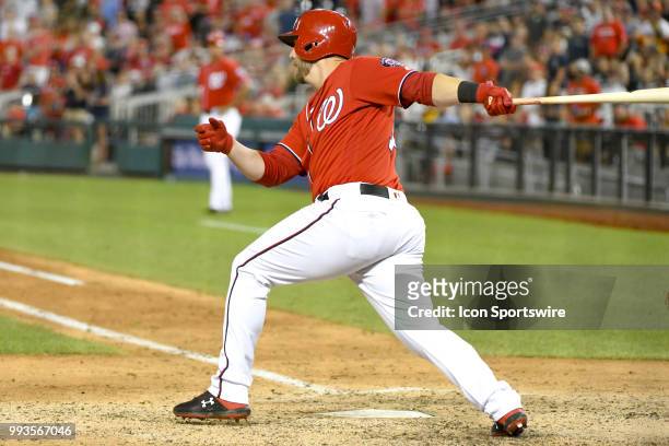Washington Nationals first baseman Mark Reynolds hits an RBI single in the seventh inning during the game between the Miami Marlins and the...