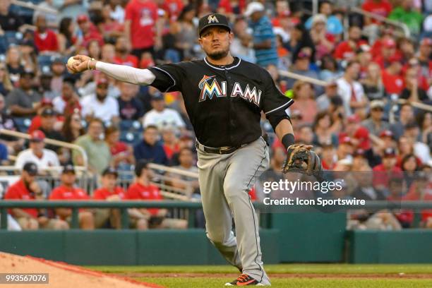 Miami Marlins third baseman Miguel Rojas throws to first base during the game between the Miami Marlins and the Washington Nationals on July 7 at...