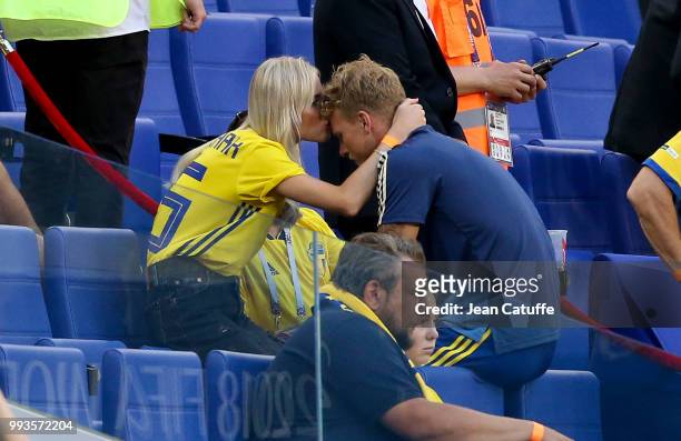 Oscar Hiljemark of Sweden is consoled by girlfriend Elin Wass following the 2018 FIFA World Cup Russia Quarter Final match between Sweden and England...