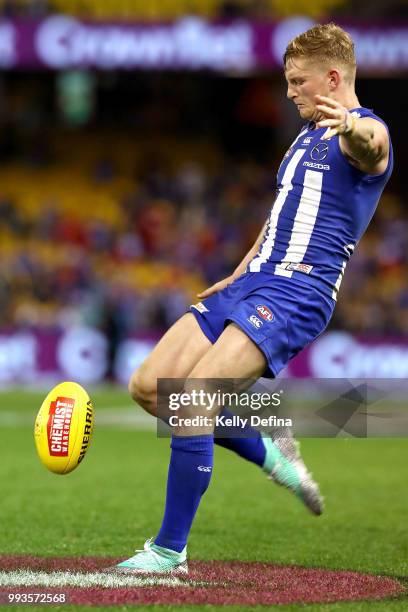 Jack Ziebell of the Kangaroos kicks the ball during the round 16 AFL match between the North Melbourne Kangaroos and the Gold Coast Suns at Etihad...