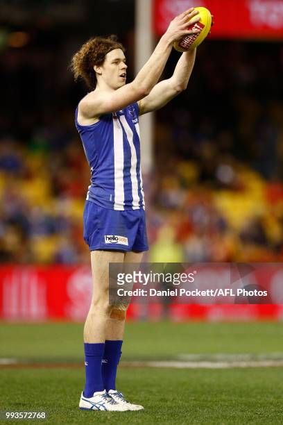 Ben Brown of the Kangaroos lines up for goal during the round 16 AFL match between the North Melbourne Kangaroos and the Gold Coast Titans at Etihad...