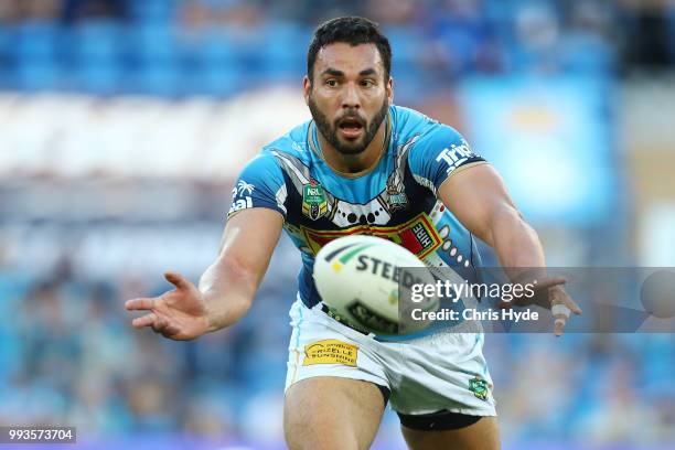 Ryan James of the Titans passes during the round 17 NRL match between the Gold Coast Titans and the Brisbane Broncos at Cbus Super Stadium on July 8,...