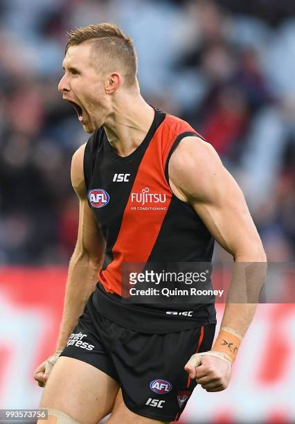 Shaun McKernan of the Bombers celebrates kicking a goal during the round 16 AFL match between the Essendon Bombers and the Collingwood Magpies at...