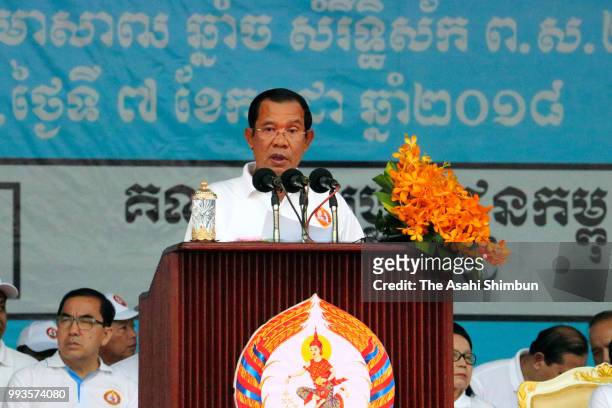 Prime Minister and President of ruling Cambodian People's Party Hun Sen addresses as the general election campaign kicks off on July 7, 2018 in Phnom...