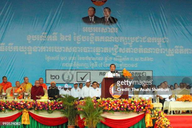 Prime Minister and President of ruling Cambodian People's Party Hun Sen addresses as the general election campaign kicks off on July 7, 2018 in Phnom...