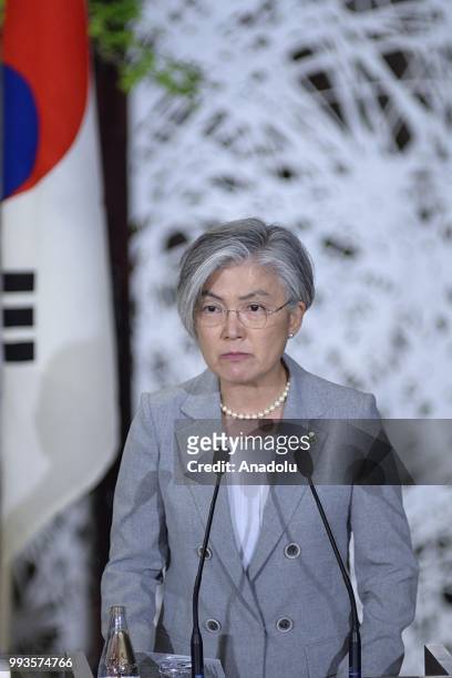 South Korean Foreign Minister Kang Kyung Wha answers to a journalist as she attends a joint press conference with Japan's Foreign Minister Taro Kono...