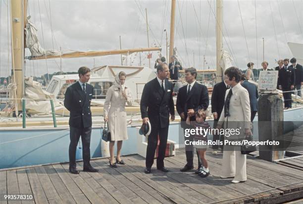 From left, Prince Charles, Princess Anne and Prince Philip, Duke of Edinburgh welcome home Scottish yachtsman Chay Blyth to Hamble after his...