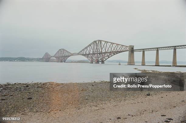 View from South Queensferry of the Forth Bridge, a cantilever railway bridge crossing the Firth of Forth, near Edinburgh in Scotland. The bridge,...