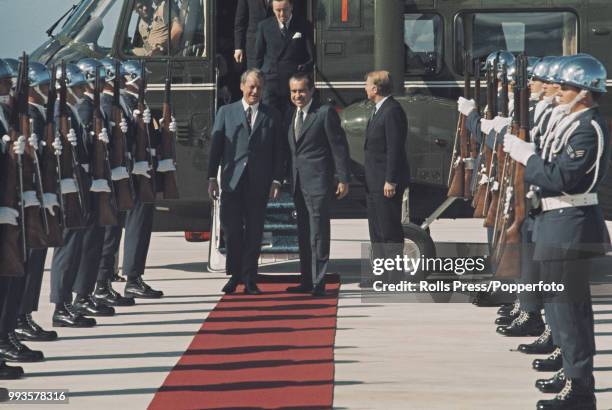Flanked by a military guard of honor, President of the United States Richard Nixon , on right, welcomes Chancellor of Germany Willy Brandt on his...