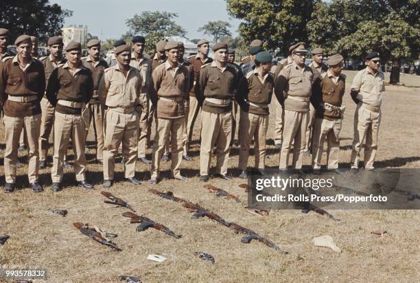 View of a group of Pakistan Army officers standing after laying down their arms at a disarmament ceremony in Dhaka , East Pakistan on 19th December...