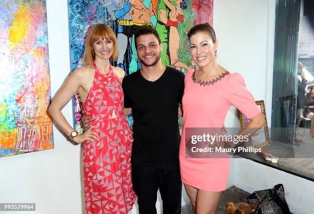 Francesca Manzi, Mr Clever Art and Iris Almario attend Juxtapop A Love Story presented by Mr. Clever Art at One One Six Two on July 7, 2018 in Los...