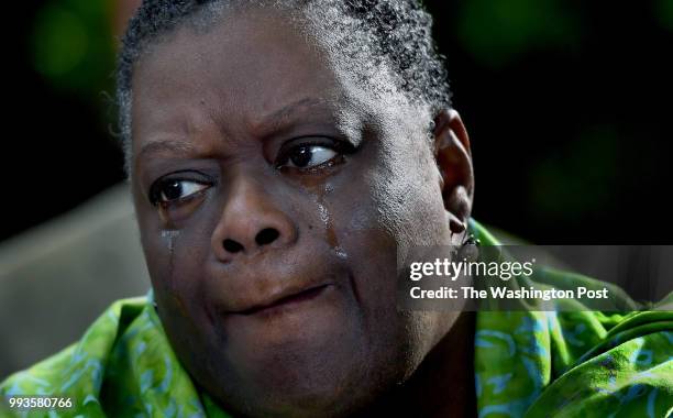 Brenda Brown-Groom sheds tears during the ceremony where the site of a brutal lynching was finally found and recognized. -120 years ago a black...