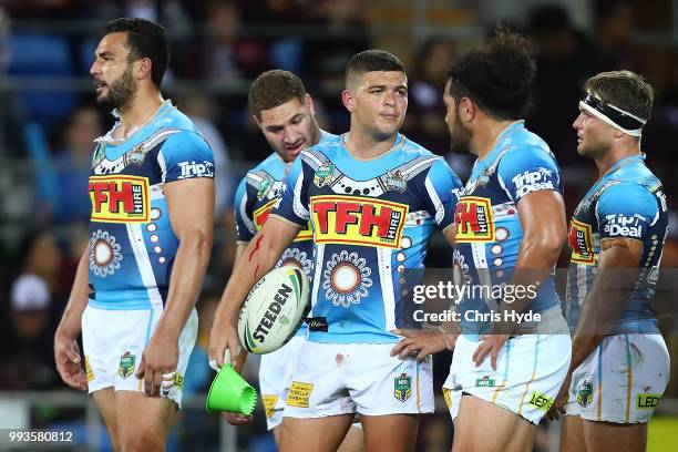 Titans look on during the round 17 NRL match between the Gold Coast Titans and the Brisbane Broncos at Cbus Super Stadium on July 8, 2018 in Gold...