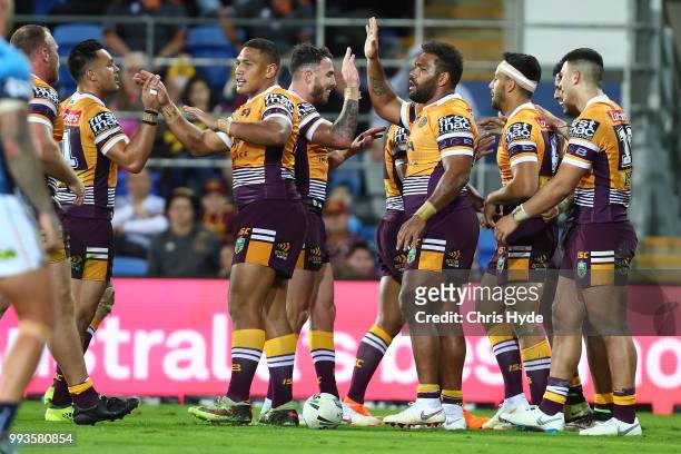 Jonus Pearson of the Broncos celebrates a try during the round 17 NRL match between the Gold Coast Titans and the Brisbane Broncos at Cbus Super...