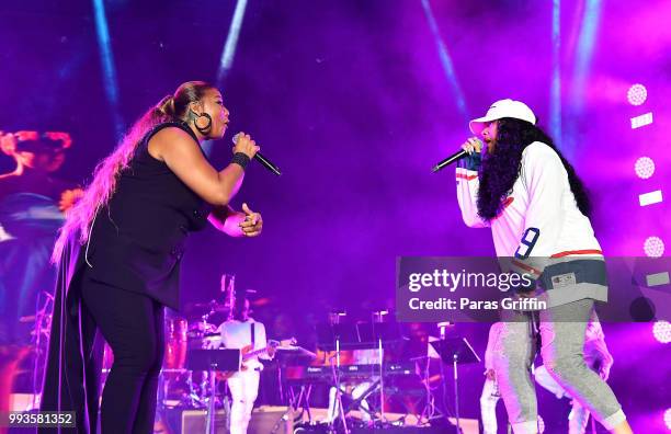 Queen Latifah and Monie Love perform onstage during Queen Latifah's "Ladies First" night at the 2018 Essence Festival - Night 2 at Louisiana...