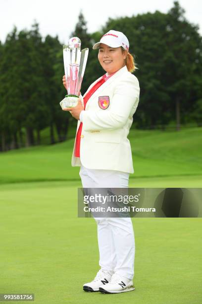 Sun-Ju Ahn of South Korea poses with the trophy after winning the Nipponham Ladies Classic at the Ambix Hakodate Club on July 8, 2018 in Hokuto,...