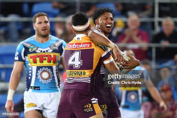Jonus Pearson of the Broncos celebrates a try during the round 17 NRL match between the Gold Coast Titans and the Brisbane Broncos at Cbus Super...